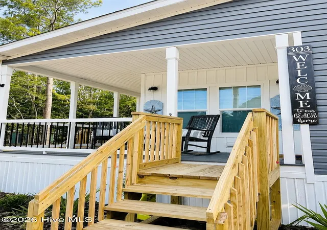 Photo 2 of Manufactured home for sale at 303 Live Oak Dr, Sunset Beach, NC 28468 | MLS# 100592220 | Listing updated on 2026-09-04