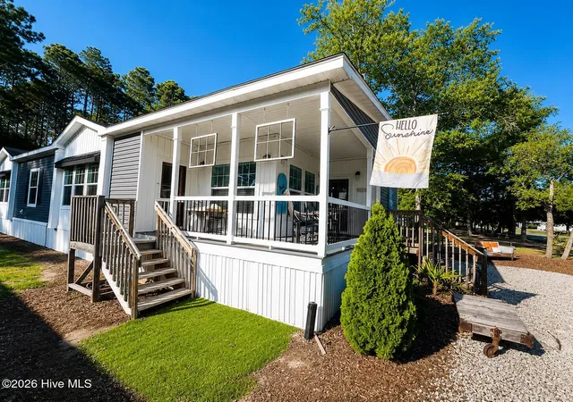 Photo 3 of Manufactured home for sale at 303 Live Oak Dr, Sunset Beach, NC 28468 | MLS# 100592220 | Listing updated on 2026-09-04