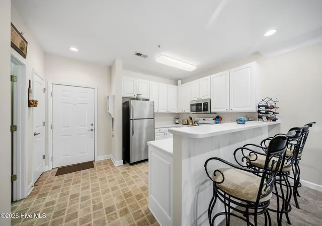 Photo 4 of Condo for sale at 235 Woodlands Way NW #Unit 14, Calabash, NC 28467 | MLS# 100592751 | Listing updated on 2026-09-11
