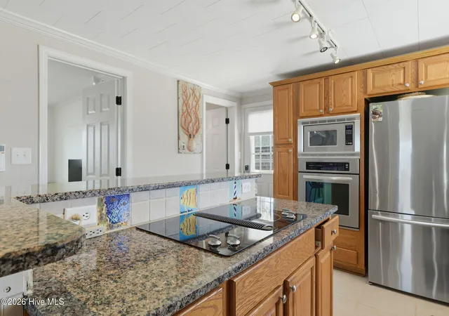 Photo 4 of Single family home for sale at 101 Delaware Ave, Carolina Beach, NC 28428 | MLS# 100566548 | Listing updated on 2026-09-14
