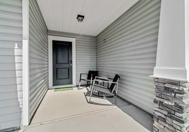 Photo 2 of Single family home for sale at 4928 Abbington Oaks Way Se, Southport, NC 28461 | MLS# 100578937 | Listing updated on 2026-08-26