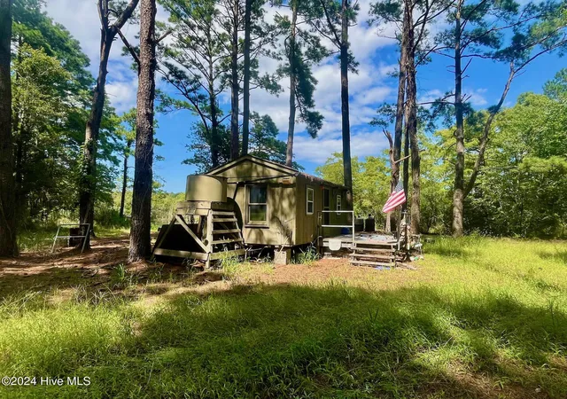 Photo 1 of Land for sale at 0 W Side Ln, Powells Point, NC 27966 | MLS# 100544511 | Listing updated on 2026-07-07