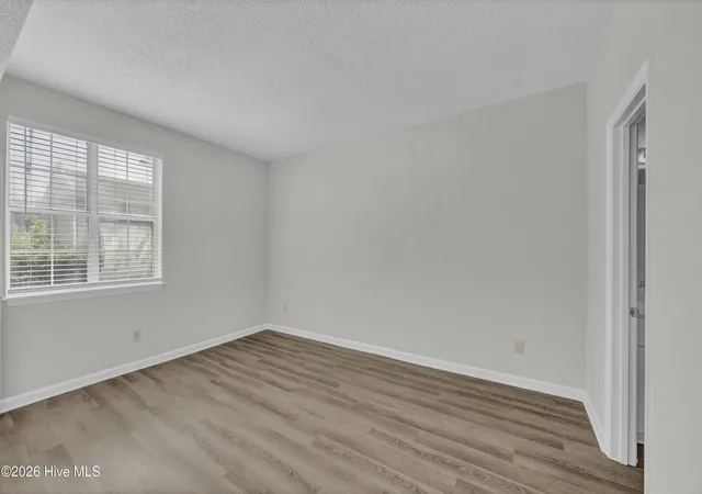 Photo 3 of Condo for sale at 719 Bragg Dr #A, Wilmington, NC 28412 | MLS# 100594332 | Listing updated on 2026-09-15