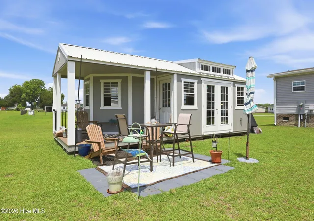 Photo 4 of Manufactured home for sale at 203 Magnolia Dr, Stella, NC 28582 | MLS# 100580454 | Listing updated on 2026-09-11