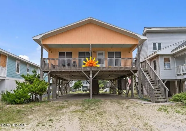 Photo 1 of Single family home for sale at 210 W Beach Dr, Oak Island, NC 28465 | MLS# 100513901 | Listing updated on 2026-09-03