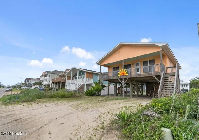 Photo 2 of Single family home for sale at 210 W Beach Dr, Oak Island, NC 28465 | MLS# 100513901 | Listing updated on 2026-09-03