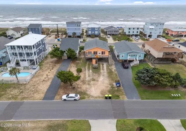 Photo 3 of Single family home for sale at 210 W Beach Dr, Oak Island, NC 28465 | MLS# 100513901 | Listing updated on 2026-09-03