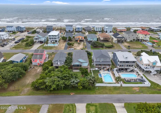 Photo 3 of Single family home for sale at 210 W Beach Dr, Oak Island, NC 28465 | MLS# 100513901 | Listing updated on 2026-09-03