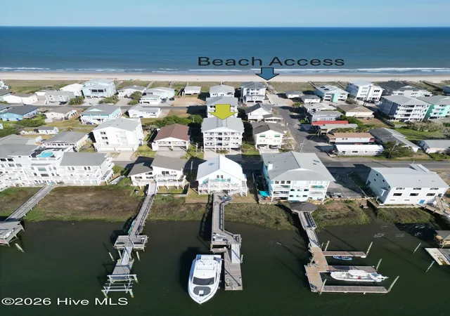 Photo 1 of Condo for sale at 1102 Canal Dr #B, Carolina Beach, NC 28428 | MLS# 100593567 | Listing updated on 2026-08-18