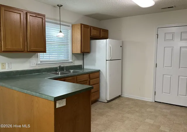 Photo 4 of Single family home for sale at 116 Live Oak Dr, Jacksonville, NC 28540 | MLS# 100575622 | Listing updated on 2026-09-21