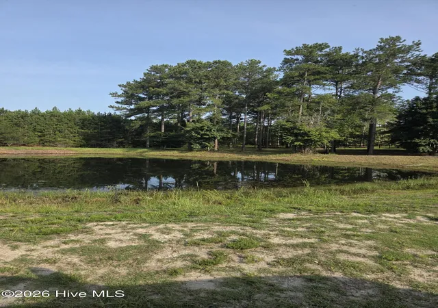 Photo 1 of Land for sale at 1062 Tinton Point SW, Sunset Beach, NC 28468 | MLS# 100596942 | Listing updated on 2026-08-17