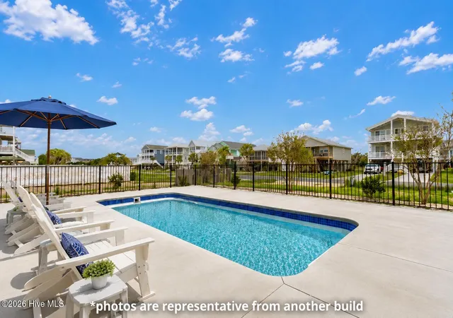 Photo 5 of Single family home for sale at 121 SE 76th Street, Oak Island, NC 28465 | MLS# 100594572 | Listing updated on 2026-09-02