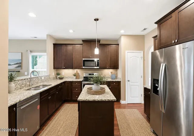 Photo 3 of Single family home for sale at 1036 Adams Landing Dr, Wilmington, NC 28412 | MLS# 100586463 | Listing updated on 2026-09-05