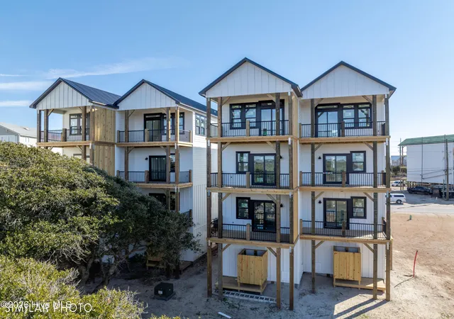 Photo 3 of Townhouse for sale at 717 N New River Dr #A, Surf City, NC 28445 | MLS# 100552614 | Listing updated on 2026-09-23