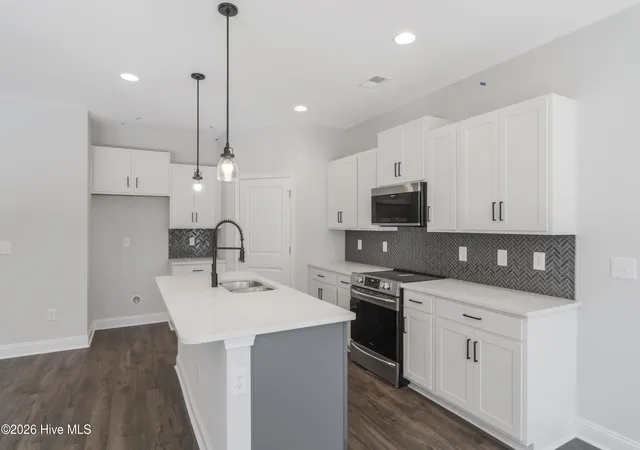 3rd image of 1115 Forest Bend Dr Nw, Carolina Shores, NC 28467 | MLS# 100585392