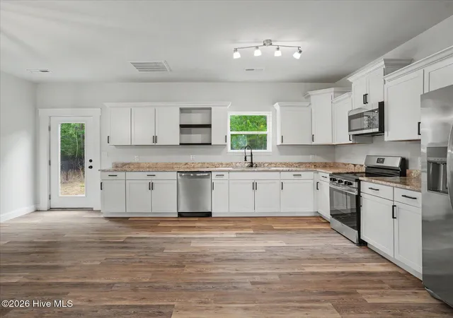Photo 3 of Single family home for sale at 603 Pennywort Ct, Sneads Ferry, NC 28460 | MLS# 100571196 | Listing updated on 2026-09-11