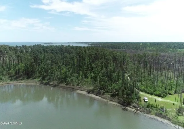 Photo 1 of Land for sale at 210 Hill Road, Smyrna, NC 28579 | MLS# 100444604 | Listing updated on 2026-03-27