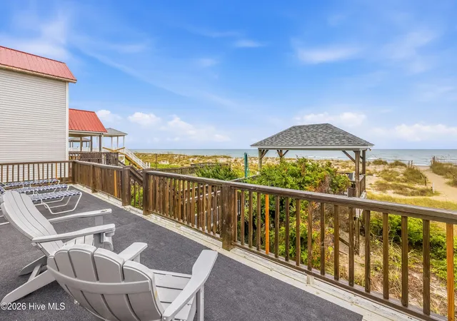 Photo 2 of Single family home for sale at 2201 E Beach Dr, Oak Island, NC 28465 | MLS# 100591181 | Listing updated on 2026-08-29