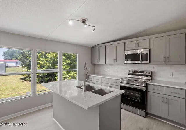 Photo 2 of Manufactured home for sale at 105 Stone Glen Pl, Pikeville, NC 27863 | MLS# 100577788 | Listing updated on 2026-08-28