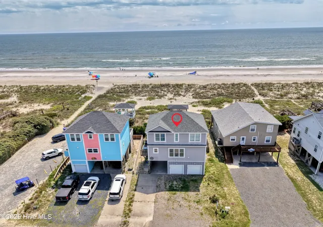 Photo 1 of Single family home for sale at 2227 E Beach Dr, Oak Island, NC 28465 | MLS# 100598605 | Listing updated on 2026-08-31