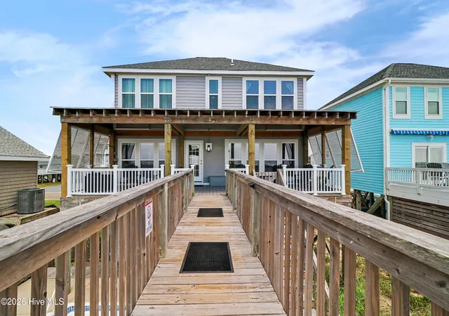 Photo 2 of Single family home for sale at 2227 E Beach Dr, Oak Island, NC 28465 | MLS# 100598605 | Listing updated on 2026-08-31