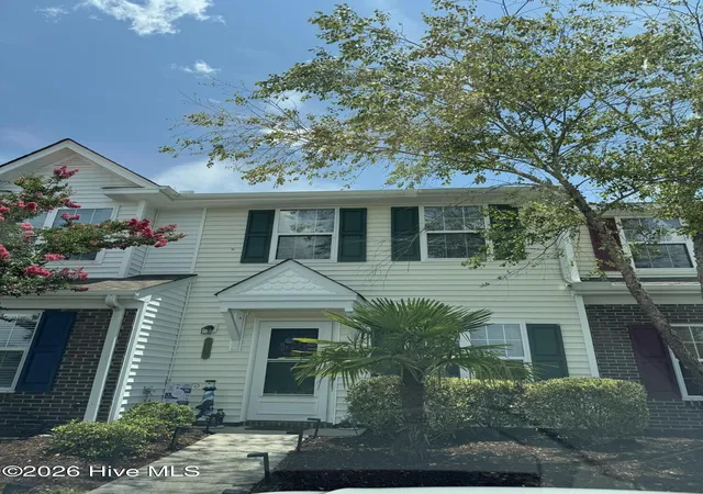 Photo 1 of Townhouse for sale at 32 Calabash Lakes Blvd, Carolina Shores, NC 28467 | MLS# 100587380 | Listing updated on 2026-08-10