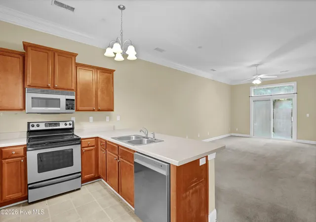 Photo 3 of Townhouse for sale at 4816 Exton Park Loop, Castle Hayne, NC 28429 | MLS# 100589299 | Listing updated on 2026-10-13
