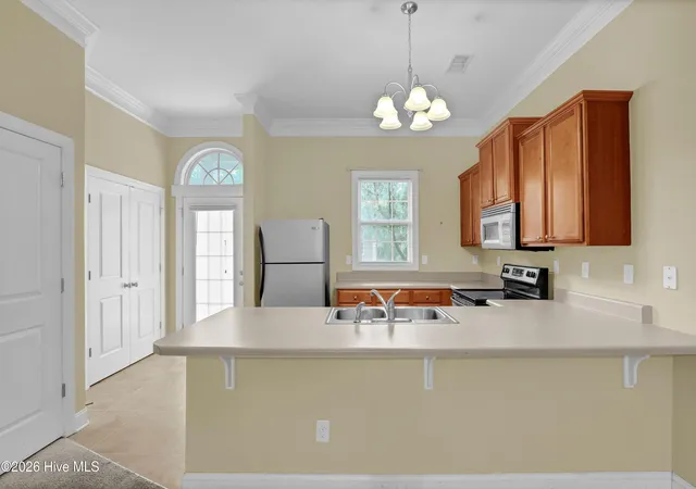 Photo 4 of Townhouse for sale at 4816 Exton Park Loop, Castle Hayne, NC 28429 | MLS# 100589299 | Listing updated on 2026-10-13