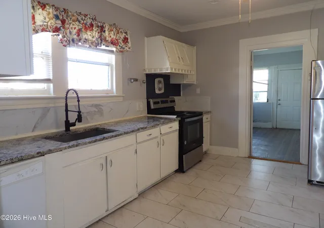 Photo 4 of Single family home for sale at 201 E Thompson Ave, Stantonsburg, NC 27883 | MLS# 100563834 | Listing updated on 2026-06-30