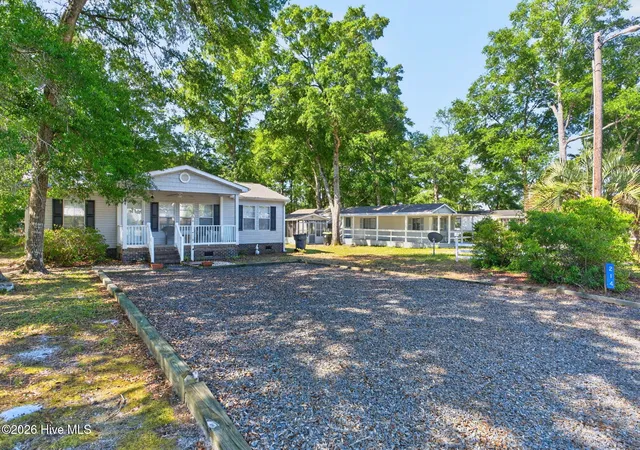 Photo 3 of Manufactured home for sale at 214 Dogwood Dr, Sunset Beach, NC 28468 | MLS# 100579470 | Listing updated on 2026-09-17