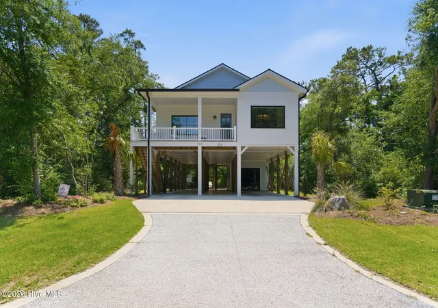 Photo 2 of Single family home for sale at 104 Sw 29th Street, Oak Island, NC 28465 | MLS# 100585535 | Listing updated on 2026-08-18