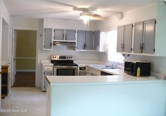 Photo 3 of Single family home for sale at 218 Parkwood Dr, Jacksonville, NC 28546 | MLS# 100573240 | Listing updated on 2026-10-07