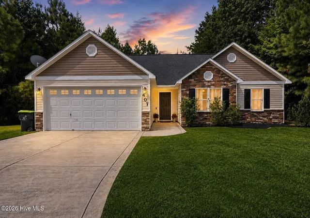 Photo 1 of Single family home for sale at 407 Hidden Oaks Dr, Jacksonville, NC 28546 | MLS# 100591331 | Listing updated on 2026-09-03