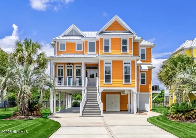 Photo 1 of Single family home for sale at 1606 E Yacht Dr, Oak Island, NC 28465 | MLS# 100583273 | Listing updated on 2026-08-01