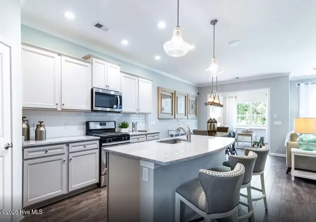 Photo 3 of Single family home for sale at 562 Glitter Bay Loop, Shallotte, NC 28470 | MLS# 100572673 | Listing updated on 2026-10-08