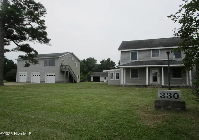 Photo 1 of Single family home for sale at 330 Narrow Shore Rd, Aydlett, NC 27916 | MLS# 100591660 | Listing updated on 2026-10-02