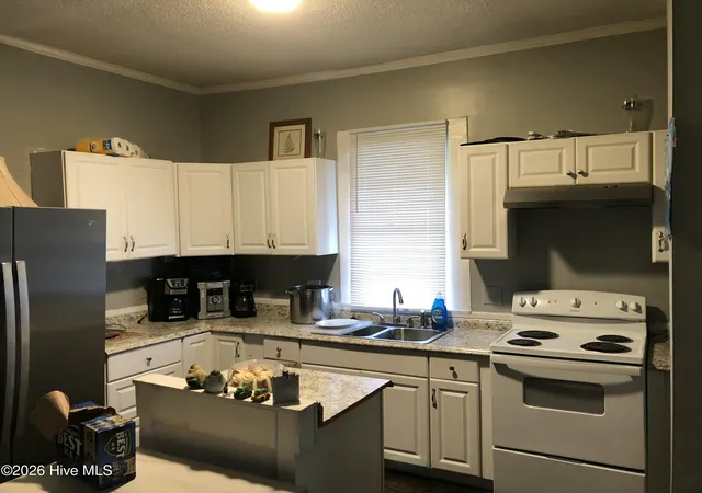 Photo 3 of Single family home for sale at 102 S 11th Street, Wilmington, NC 28401 | MLS# 100580744 | Listing updated on 2026-09-15