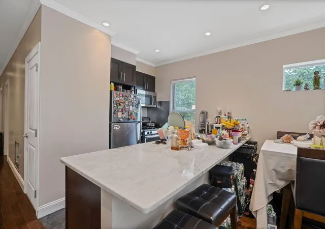 Listing Photo 4 - Condo for sale in building located at 70-49 66Th Pl, New York City, NY 11385 - Unit #2 units
