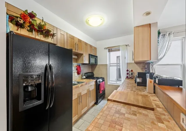 Photo 3 of Sale Pending at 61 85 Grove St, Ridgewood, NY 11385 | MLS# RLS20049928 | Listing updated on 2025-11-25