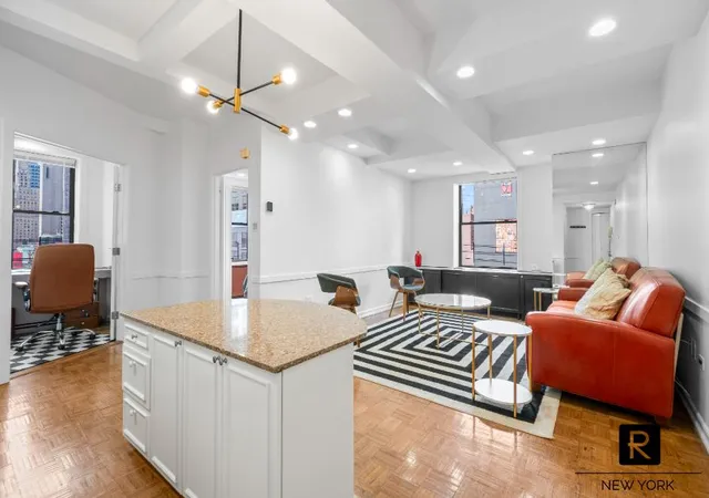 Listing Photo 1 - Condo for sale in building located at 150 W 51St St, New York, NY 10019 - Unit #1007