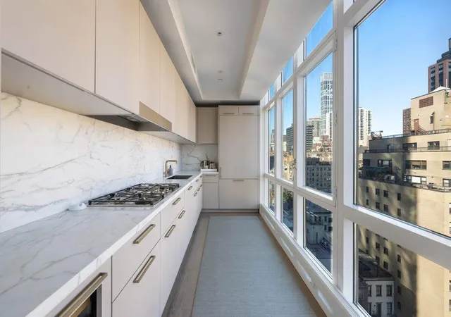 Listing Photo 1 - Condo for sale in building located at 305 E 51St St, New York City, NY 10022 - Unit #11A