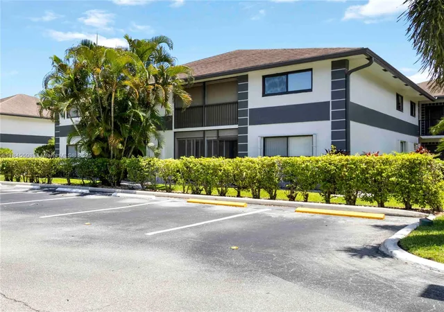 Listing Photo 1 - Condo for sale in building located at 15364 Lakes Of Delray Blvd, Delray Beach, FL 33484 - Unit #48