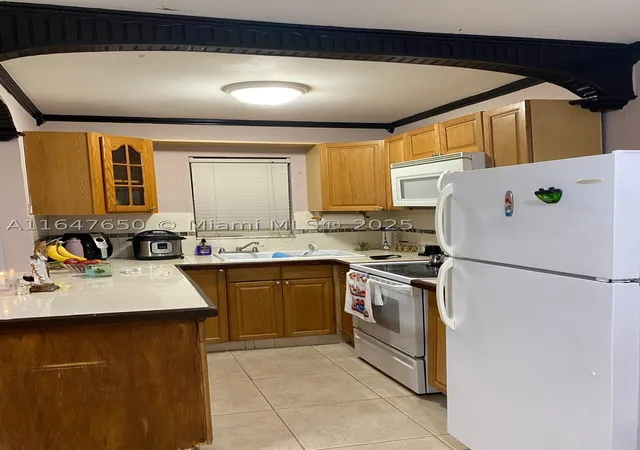 Photo 4 of Condo for sale at 4050 Nw 135Th St #20-1, Opa Locka, FL 33054 | MLS# A11647650 | Listing updated on 2026-01-19