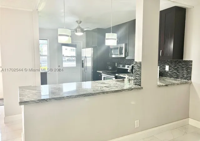 Photo 4 of Condo for sale at 1445 Atlantic Shores Blvd #102, Hallandale Beach, FL 33009 | MLS# A11702544 | Listing updated on 2026-02-28