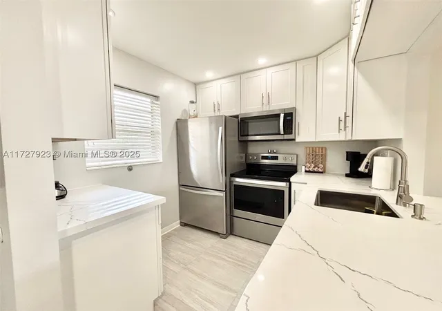 Listing Photo 2 - Condo for sale in building located at 3405 Nw 48Th Ave, Lauderdale Lakes, FL 33319 - Unit #407