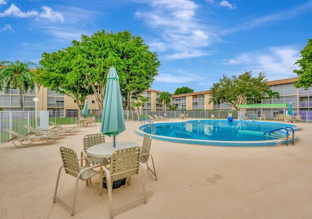 2nd image of 400 Vlg Grn Cir W, Palm Springs, FL 33461