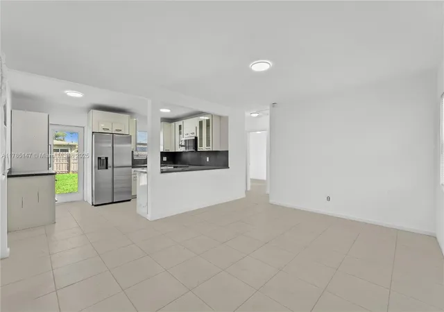 Single family home for sale at 1201 NW 10th Place, Fort Lauderdale, FL 33311 | MLS# A11785147 | Listing updated on 2025-05-08