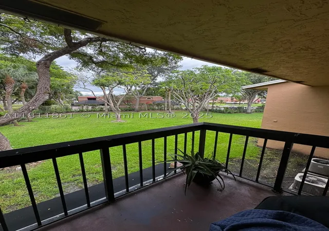Photo 2 of Condo for sale at 6023 N 10th Ave N #215, Green Acres, FL 33463 | MLS# A11811861 | Listing updated on 2026-08-04