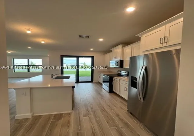 Photo 3 of Townhouse for sale at 14171 Sw Thorens Dr, Port Saint Lucie, FL 34987 | MLS# A11831785 | Listing updated on 2026-10-02
