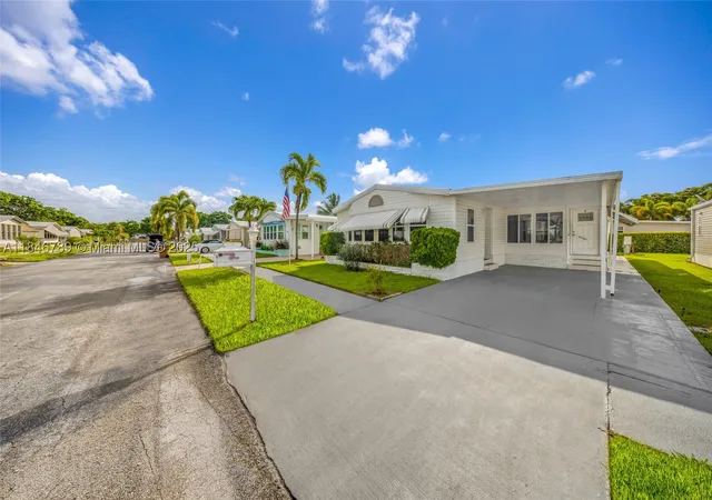 Photo 3 of Manufactured home for sale at 5298 Nw 4Th Ter, Deerfield Beach, FL 33064 | MLS# A11846789 | Listing updated on 2026-08-24